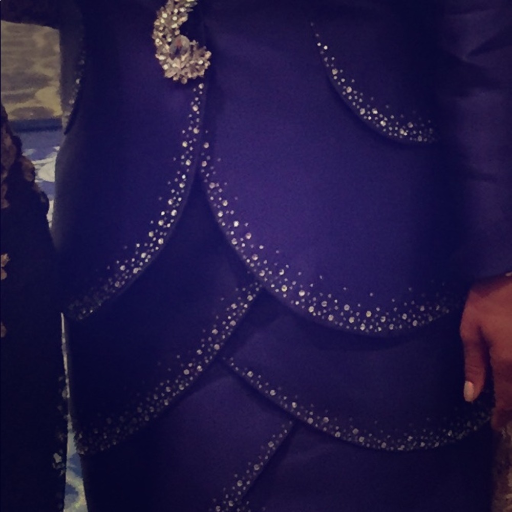 Two piece periwinkle evening attire.